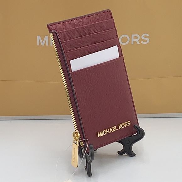 Michael Kors Jet Set Travel Medium Top Zip Card
Case Wallet
Dark Sherry color - Picture 11 of 11